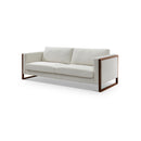 SOFA ESTACIONARIO DE TRES ASIENTOS EN TELA BLANCA Y PATAS MARRON OSCURO