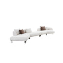 SOFA SECCIONAL ESTACIONARIO EN TELA BEIGE Y PATAS TRANSPARENTES
