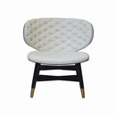 BUTACA ESTACIONARIA TAPIZADA EN PU COLOR  BLANCO Y PATAS NEGRAS CON CASQUILLOS DORADOS