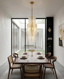 CHANDELIER, IRON AND GLASS, IRON IN BRUSHED BRASS FINISH, CLEAR GLASS
