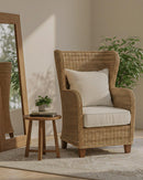 BUTACA ESTACIONARIA EN RATAN Y TELA BLANCA