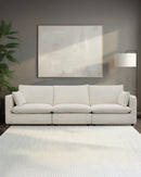 SOFA ESTACIONARIO DE CUATRO ASIENTOS EN TELA BEIGE CREMA