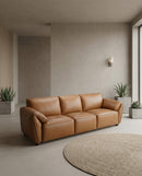 SOFA ESTACIONARIO DE TRES ASIENTOS CON FRENTE DE PIEL CAMEL