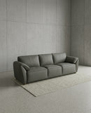 SOFA ESTACIONARIO DE TRES ASIENTOS CON FRENTE DE PIEL VERDE