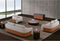 SOFA ESTACIONARIO DE TRES ASIENTOS EN TELA BEIGE
