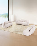 SOFA ESTACIONARIO DE TRES ASIENTOS EN TELA BEIGE