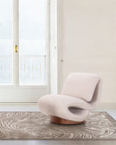 BUTACA GIRATORIA EN TELA BEIGE